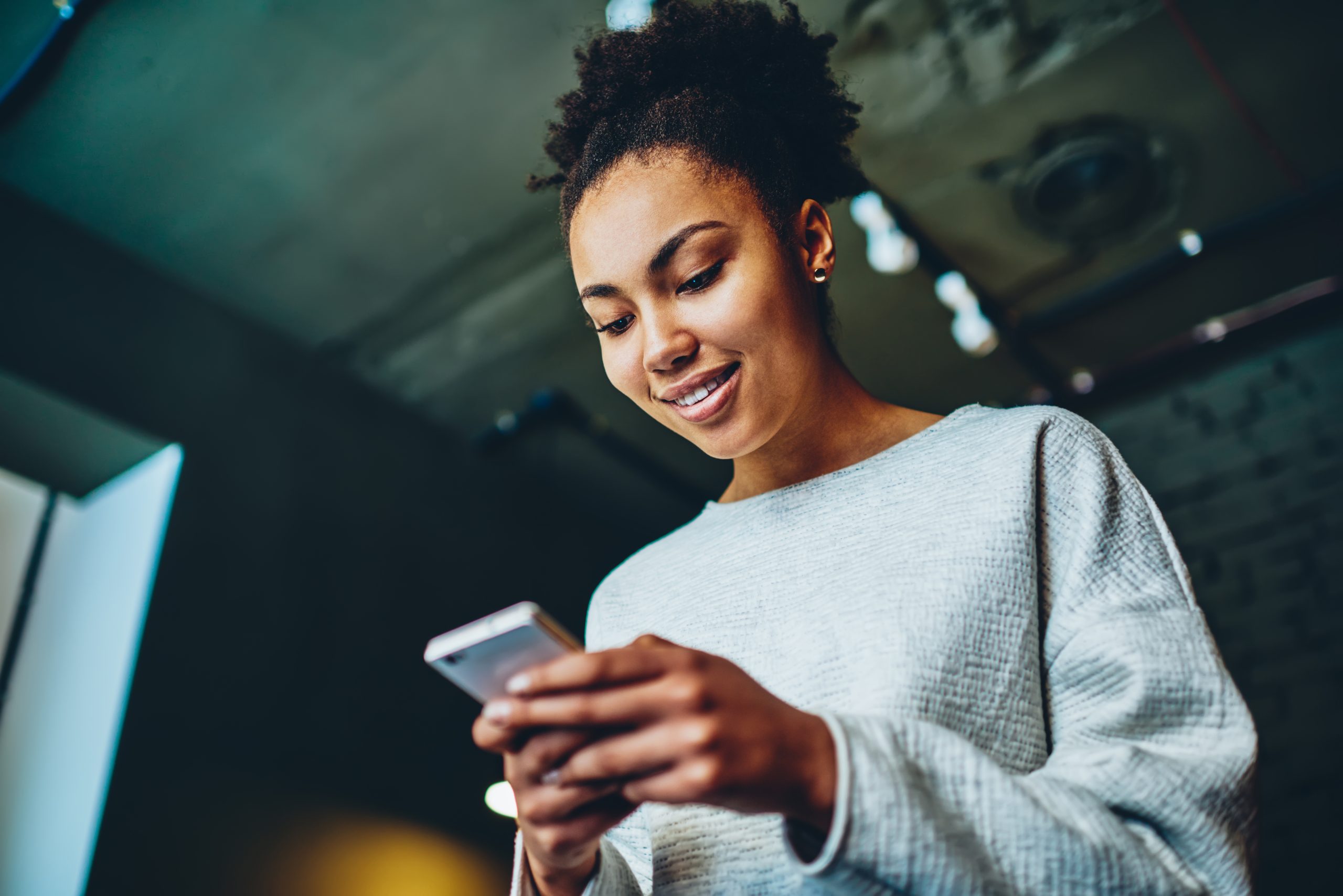 woman receiving notification on phone